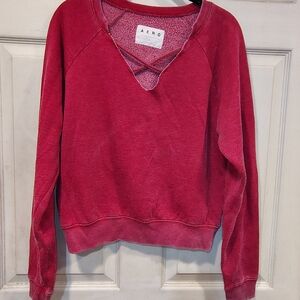 AERO Women's Sweatshirt Size M Faded Red Pullover with V-Neck Crisscross Detail